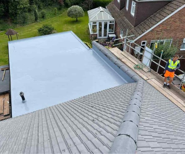 This is a photo of a newly installed hip roof, with a combined liquid covered flat roof. Work carried out by CNB Roofing Pontefract