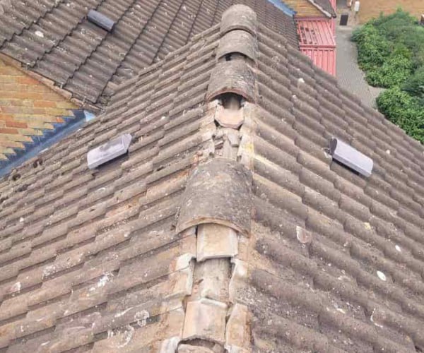 This is a photo if a roof ridge which has missing tiles. The ridge tiles are being replaced by CNB Roofing Pontefract